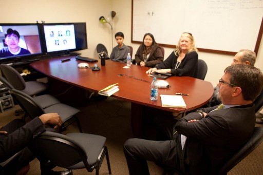 Bill Perry and Ash Carter meeting with Milton over a VSee High-Definition Video Call width=